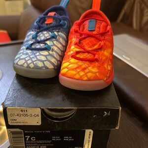 Nike Blue and Orange Sneakers with Textured Upper and Comfortable Sole